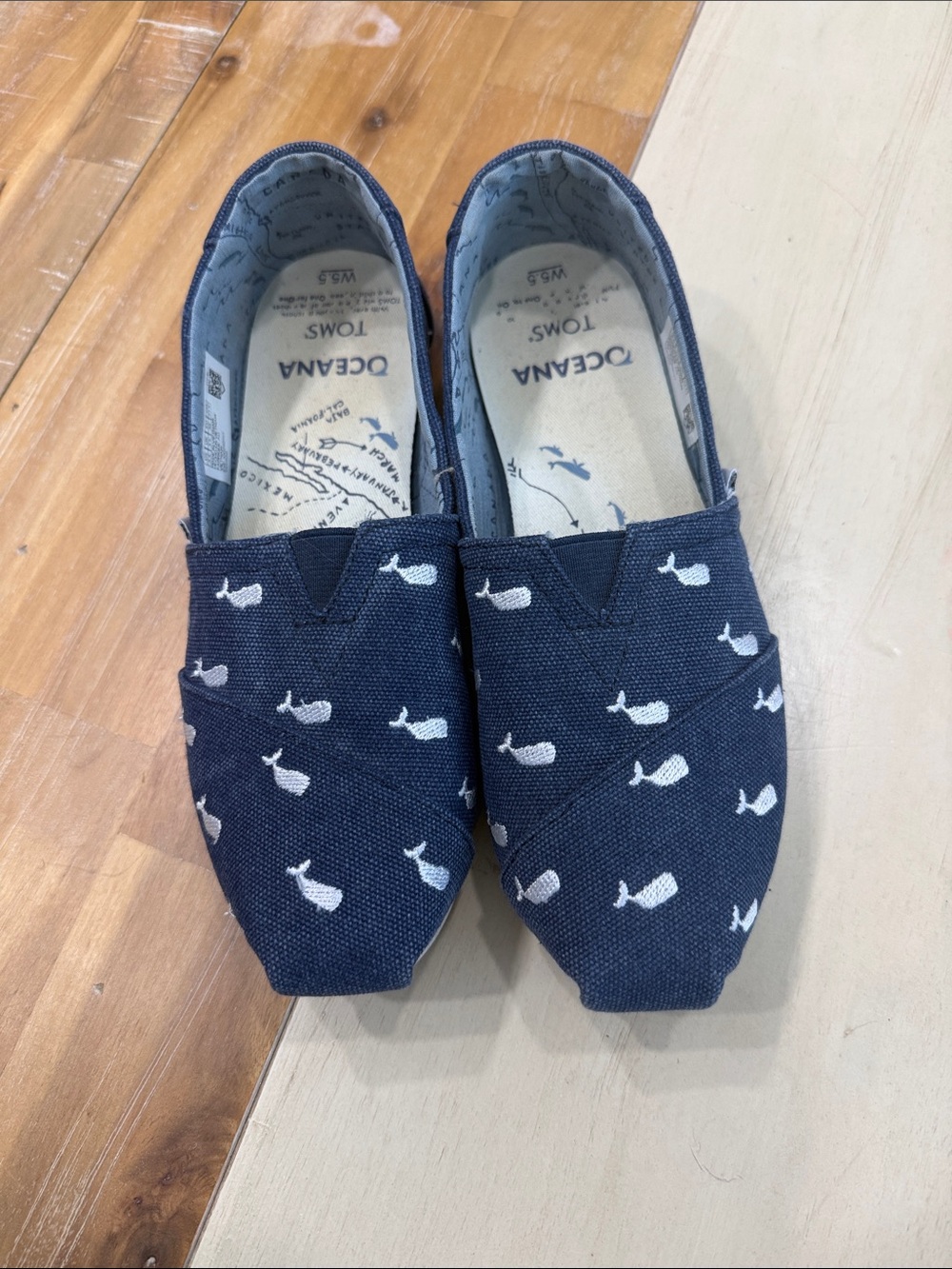TOMS Navy Slip-On Flats with White Whale Print